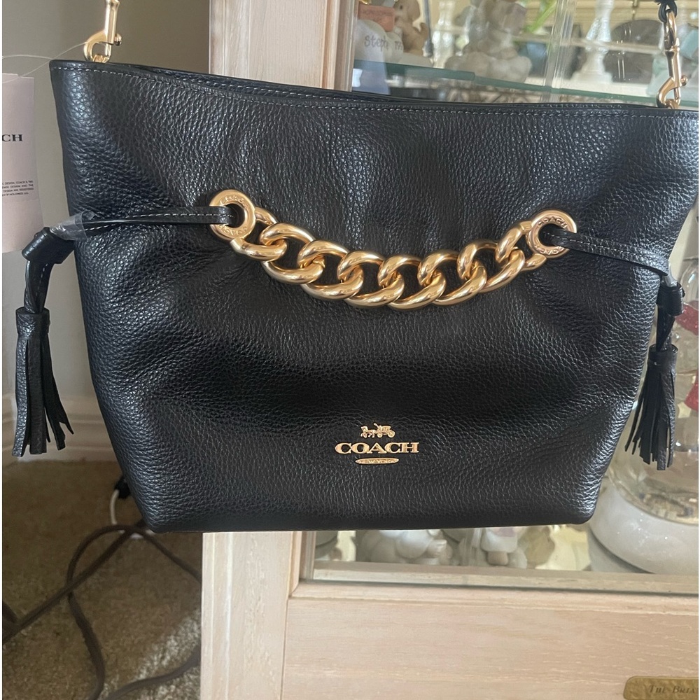Coach Crossbody but also had a shorter handle
